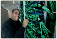 it engineer working on a server rack